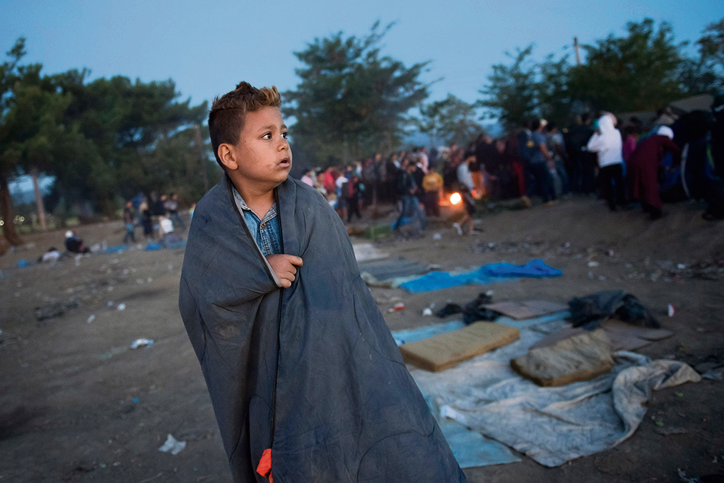 Calais, Gran Bretagna, bambini, profughi, siriani