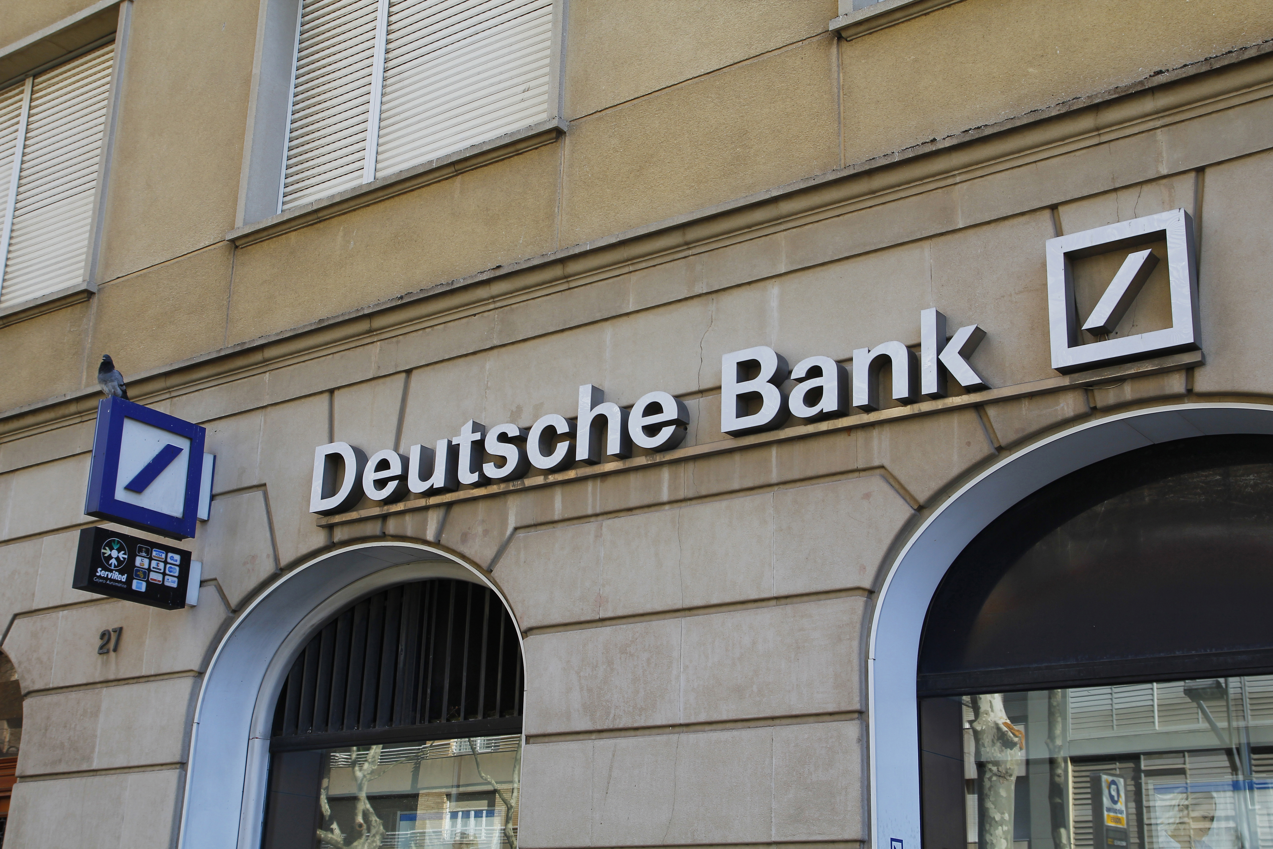 Reus, Spain - February 20, 2016: Deutsche Bank office, with white text and logo, in the city of Reus at Spain, on februrary 20, 2016