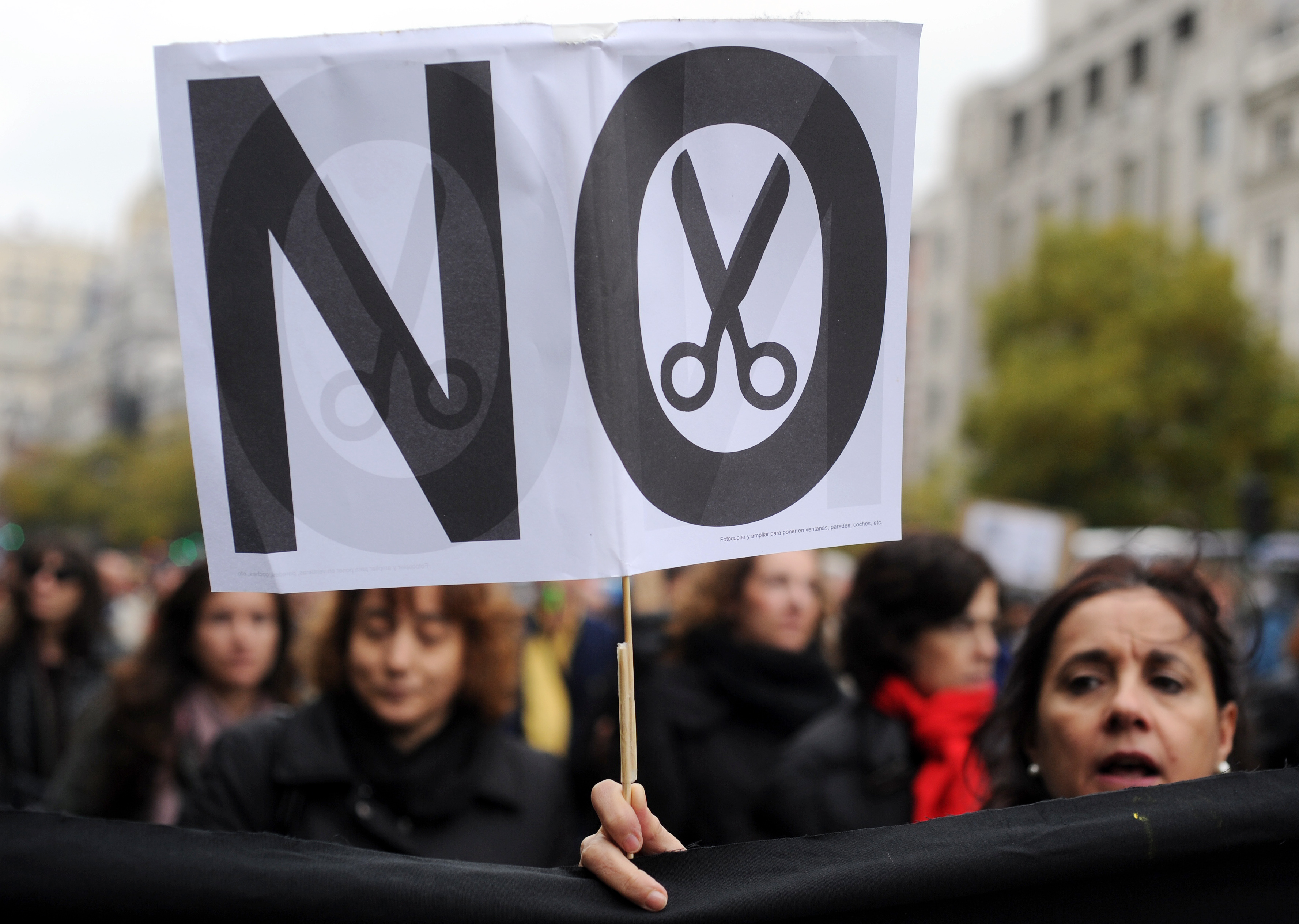 Government employees and civil servants take part in a demonstration against the Spanish government's latest austerity measures, in the center of Madrid, on November 16, 2012. Spain announced on November 15, 2012 it has moved into a second year of a job-killing recession, a day after millions joined anti-austerity strikes and vast protests. AFP PHOTO/DOMINIQUE FAGET        (Photo credit should read DOMINIQUE FAGET/AFP/Getty Images)