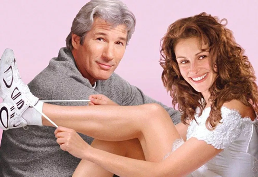 Richard Gere e Julia Roberts in una locandina del film "Se scappi, ti sposo"