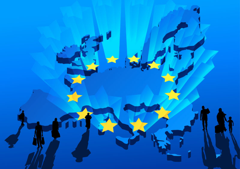 Silhouettes of refugee on background the map and shining stars Europe Union flag