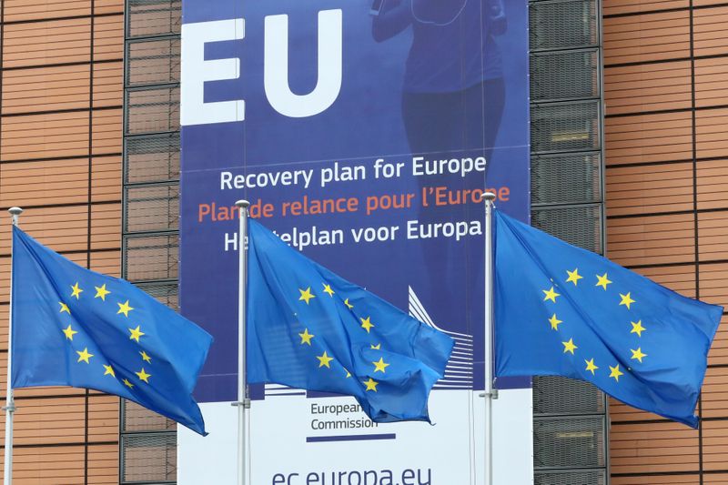 European Union flags flutter outside the European Commission headquarters, ahead of an EU leaders summit at the European Council headquarters, in Brussels, Belgium July 16, 2020. REUTERS/Yves Herman