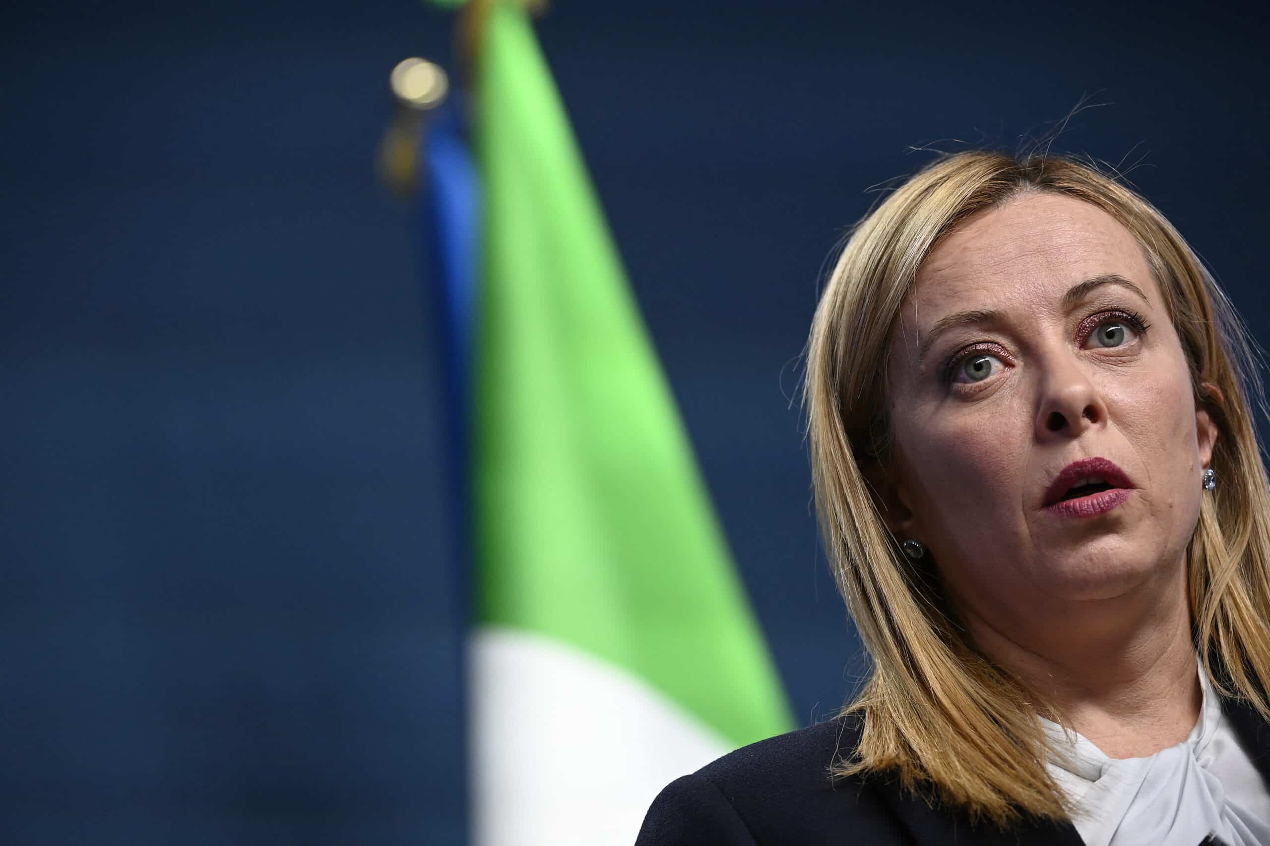 Giorgia Meloni in conferenza stampa. Si dice "soddisfatta" per i risultati ottenuti al vertice Ue(Photo by John THYS / AFP)