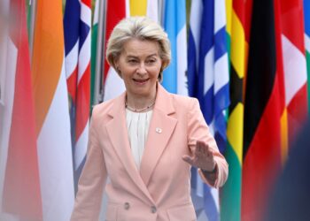 European Commission President Ursula von der Leyen waves as she arrives to take part in a Summit on Peace in Ukraine at the luxury Burgenstock resort, near Lucerne in central Switzerland, on June 15, 2024.  (Photo by Ludovic MARIN / AFP)