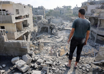 A Palestinian man stares at the rubble of the Alloush family's house, levelled in an Israeli strike in Jabalia in the northern Gaza Strip on November 10, 2024 (Photo by Omar AL-QATTAA / AFP)